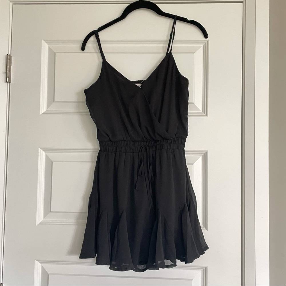 Francesca’s black flowy romper